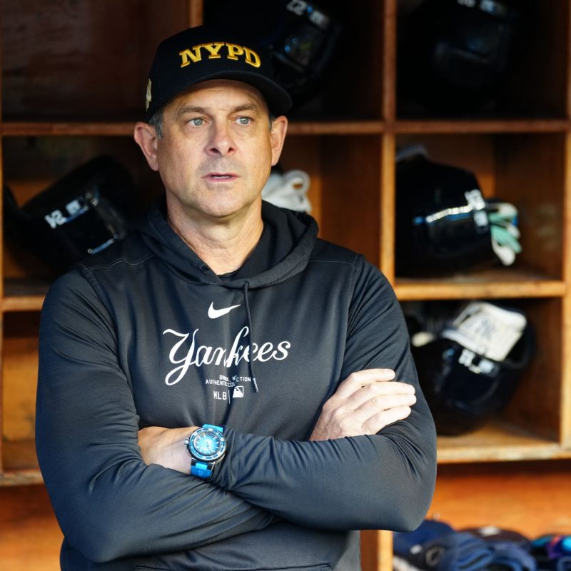 NEW YORK, NY - SEPTEMBER 11:   Manager Aaron Boone #17 of the New York Yankees looks on from the dugout prior to the game between the Kansas City Royals and the New York Yankees at Yankee Stadium on Wednesday, September 11, 2024 in New York, New York. (Photo by Daniel Shirey/MLB Photos via Getty Images)