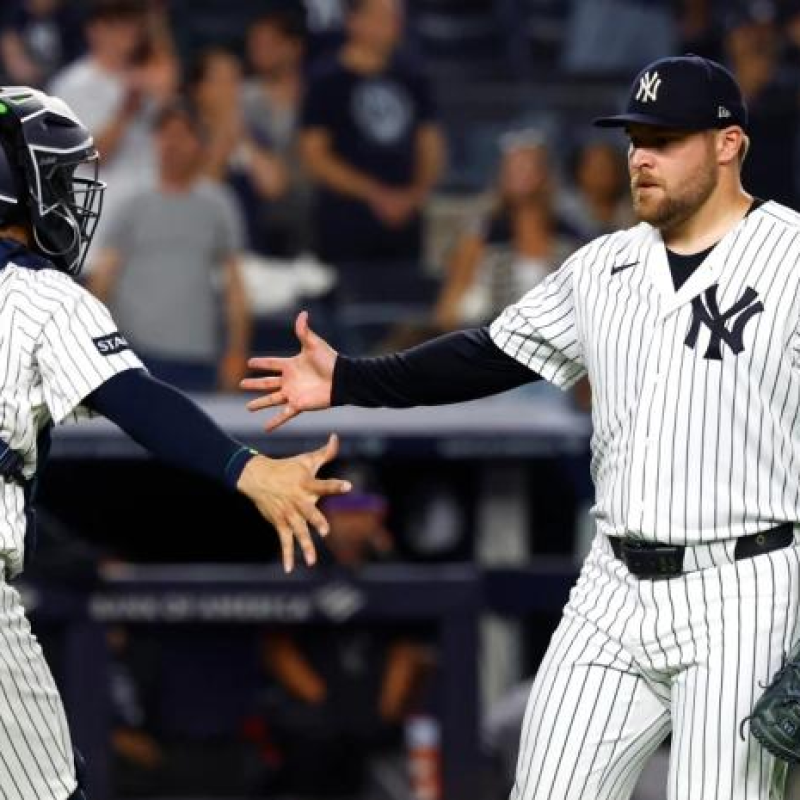 David Bednar saluda a Austin Wells